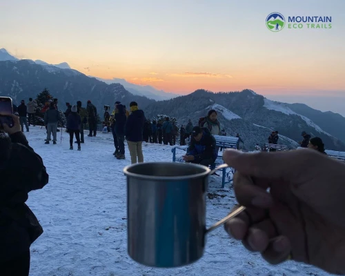Trekker Enjoying Tea At Poonhill